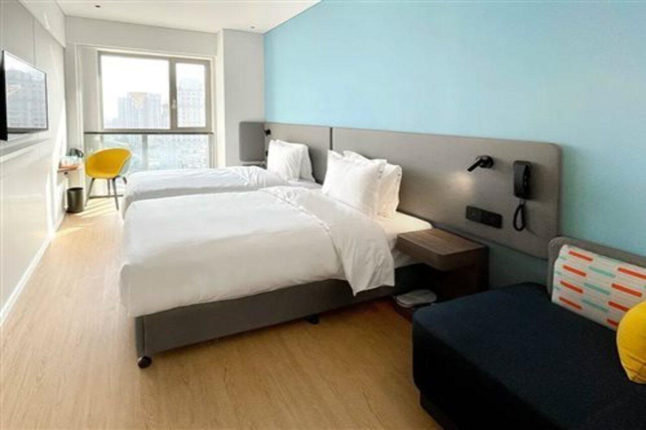 Holiday Inn Express Shanghai Baoyang By Ihg Exteriör bild